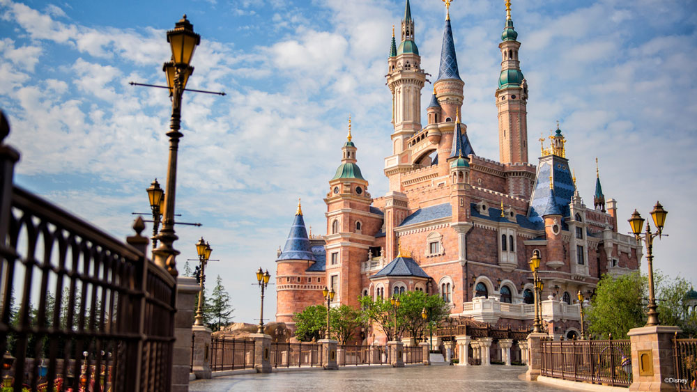 Disneyland Castle - Disneyland Castle during the day with blue sky