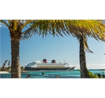Disney Cruise Ship - Cruise ship docked with blue sky and sea